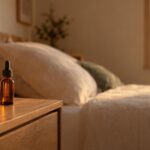 Bedside table with amber dropper bottle and warm light for sleep