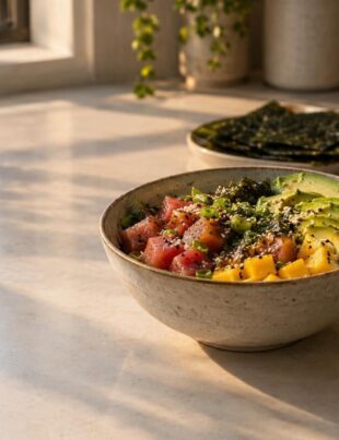 Cannabis-infused poke bowl with fresh ingredients on kitchen counter