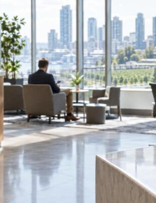 Bank lobby interior with subtle cannabis products and cityscape outside