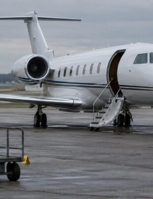 Private jet on tarmac with law enforcement vehicles after drug seizure